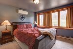 Copper Claim Lodge bedroom with a king bed.